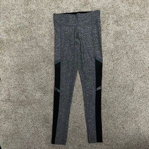 Pink “Ultimate” leggings with sheer detail on the side